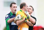27 May 2007; Brian McBrearty and Martin Kennedy, London, restrain Declan Maxwell, Leitrim. Bank of Ireland Connacht Senior Football Championship, London v Leitrim, Emerald Gaelic Grounds, Ruislip, London, England. Picture credit: Russell Pritchard / SPORTSFILE