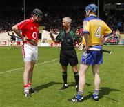 27 May 2007; Referee Pat O'Connor speaks to the team captains Kieran Murphy, left, Cork, and Frank Lohan, Clare, before the start of the game. Guinness Munster Senior Hurling Championship Quarter-Final, Cork v Clare, Semple Stadium, Thurles, Co. Tipperary. Picture credit: Brendan Moran / SPORTSFILE