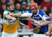 27 May 2007; Matthew Whelan, Laois, in action against Paul Cleary, Offaly. Guinness Leinster Hurling Championship, Offaly v Laois, O'Connor Park, Tullamore, Co. Offaly. Photo by Sportsfile