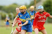 26 May 2007; Emily Hayden, Tipperary, in action against Joanne O'Callaghan, Cork. Gala All Ireland Senior Championship, McGrath Cup, Tipperary v Cork, Toomevara, Co. Tipperary. Picture credit: Matt Browne / SPORTSFILE