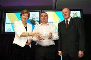 26 May 2007; Mark Scannell, Glanmire, Co. Cork, is presented with the Women's Underage Coach of the Year award by Sheila Gillick, left, and Tony Colgan, President of Basketball Ireland. Basketball Ireland Annual Awards 2007, Citywest Hotel, Conference, Leisure & Golf Resort, Saggart, Co Dublin. Picture credit: Brendan Moran / SPORTSFILE