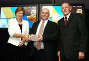 26 May 2007; Sean O'Reilly, receives the Senior Men's International Player of the Year award, on behalf of Pat Burke, from Sheila Gillick, left, and Tony Colgan, President of Basketball Ireland. Basketball Ireland Annual Awards 2007, Citywest Hotel, Conference, Leisure & Golf Resort, Saggart, Co Dublin. Picture credit: Brendan Moran / SPORTSFILE