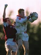 9 January 2000; Barry Clarke of Louth in action against Damien Healy of Westmeath during the O'Byrne Cup First Round match between Louth and Westmeath at St Mary's GAA Club in Ardee, Louth. Photo by Ray McManus/Sportsfile
