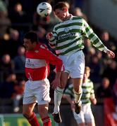 9 January 2000; Billy Woods of Shamrock Rovers in action against Mark Herrick of Cork City during the Harp Larger FAI Cup Second Round match between Shamrock Rovers and Cork City at Morton Stadium in Santry, Dublin. Photo by David Maher/Sportsfile