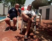 30 March 1999; Republic of Ireland manager Brian Kerr and assistant manager Noel O'Reilly, left, relax beside the pool at their team hotel in Kano, Nigeria, at the 1999 FIFA World Youth Championship Finals. Photo by David Maher/Sportsfile