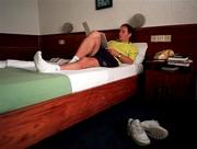 30 March 1999; Republic of Ireland manager Brian Kerr studies notes in his hotel room in Ibadan, Nigeria, at the 1999 FIFA World Youth Championship Finals. Photo by David Maher/Sportsfile