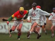 30 January 2000; Colin Boran of Kildare in action against Christy Coady of Carlow during the Keogh Cup Quarter-Final match between Kildare and Carlow at Naas GAA Grounds in Kildare. Photo by Damien Eagers/Sportsfile
