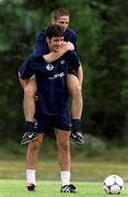 17 July 1999; Republic of Ireland's Clive Clarke gives Graham Barrett a lift during a Republic of Ireland training session at Karlbergsplan in Linkoping, Sweden. Photo by David Maher/Sportsfile