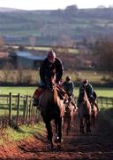14 January 2000; Danoli, and head lad Noel Hamilton, during the morining training run on the gallops at the Tom Foley Aghabeg Yard in Bagenalstown, Carlow. Photo by Matt Browne/Sportsfile