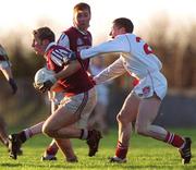 9 January 2000; Derek Heavin of Westmeath in action against David Reilly of Louth during the O'Byrne Cup First Round match between Louth and Westmeath at St Mary's GAA Club in Ardee, Louth. Photo by Ray McManus/Sportsfile