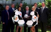 28 July 1999; At the at the announcement of Ireland's largest sports sponsorship between the FAI and Telecom Eireann including the naming rights of the FAI's stadium, which will be known as Eircom Park, are, from left, Pat Quigley, FAI President, Ray MacSharry, Chairman, Eircom, model Gail Kaneswaren, Republic of Ireland manager Mick McCarthy, Alfie Kane, Chief Executive, Eircom, model Jill Diffley, former Republic of Ireland goalkeeper Packie Bonnar and Bernard O'Byrne, FAI Chief Executive. Photo by Brendan Moran/Sportsfile
