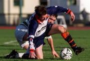 23 January 2000; Eoin Bennis of UCD in action against Matt Britton of Shamrock Rovers during the Eircom League Premier Division match between Shamrock Rovers and UCD at Morton Stadium in Santry, Dublin. Photo by David Maher/Sportsfile