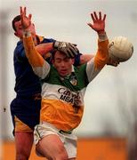 23 January 2000; Finbar Cullen of Offaly in action against Trevor Smullen of Longford during the O'Byrne Cup Semi-Final match between Longford and Offaly at Pearse Park in Longford. Photo by Ray McManus/Sportsfile