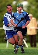 2 January 2000; Fintan Clandillion of Dublin in action against Shay Boland of Blue Stars during the Millennium Blue Stars Exhibition Game between Blue Stars and Dublin at Páirc de Burca in Stillorgan, Dublin. Photo by Damien Eagers/Sportsfile