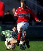 9 January 2000; Colin O'Brien of Cork City in action against Brian Byrne of Shamrock Rovers during the Harp Larger FAI Cup Second Round match between Shamrock Rovers and Cork City at Morton Stadium in Santry, Dublin. Photo by Ray Lohan/Sportsfile