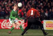 10 February 1999; Damien Duff of Republic of Ireland shoots at the Paraguay goalkeeper Ricardo Tauarell during the International Friendly match between Republic of Ireland and Paraguay at Lansdowne Road in Dublin. Photo by David Maher/Sportsfile
