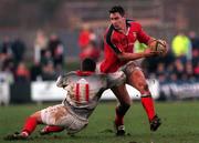 15 January 2000; David Wallace of Munster is tackled by Rory Greenslades Jones of Pontypridd during the Heineken Cup Pool 4 Round 6 match between Pontypridd and Munster at Sardis Road in Pontypridd, Wales. Photo by Matt Browne/Sportsfile