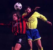 14 January 2000. Glen Crowe of Bohemians Declan Boyle of Finn Harps during the Eircom League Premier Division match between Bohemians and Finn Harps at Dalymount Park in Dublin. Photo by David Maher/Sportsfile