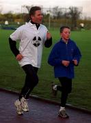 25 December 1999; Former World 5,000m Champion Eamonn Coghlan and his son John, at Belfield Running Track in Dublin, during one of the many 'Goal Miles' on Christmas Day. Photo by Ray McManus/Sportsfile