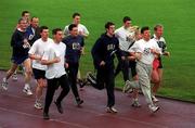 25 December 1999; Participants at Belfield Running Track in Dublin, during one of the many 'Goal Miles' on Christmas Day. Photo by Ray McManus/Sportsfile