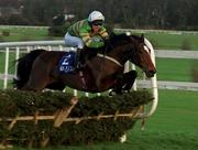 29 December 1999; Istabraq, with Charlie Swan up, jumps the last on their way to winning the AIB Agri-Business December Festival Hurdle at Leopardstown Racecourse in Dublin. Photo by Damien Eagers/Sportsfile