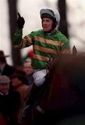 23 January 2000; Jockey Charlie Swan after winning the AIG Europe Champion Hurdle, on Istabraq, at Leopardstown Racecourse in Dublin. Photo by Ray Lohan/Sportsfile