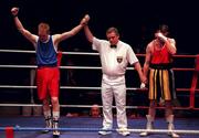 22 January 2000; James Moore of Arklow is declared victorious over Kevin Cumiskey of Tralee following their Irish National Boxing Championships Welterweight Semi-Final at the National Stadium in Dublin. Photo by Ray Lohan/Sportsfile