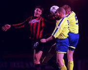 14 January 2000; Jamie Harris of Bohemians in action against John Paul Boyle and Gavin Dykes of Finn Harps during the Eircom League Premier Division match between Bohemians and Finn Harps at Dalymount Park in Dublin. Photo by David Maher/Sportsfile