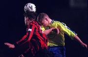 14 January 2000; Jamie Harris of Bohemians in action against John Paul Boyle of Finn Harps during the Eircom League Premier Division match between Bohemians and Finn Harps at Dalymount Park in Dublin. Photo by David Maher/Sportsfile