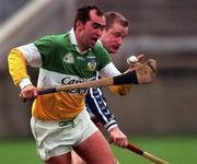 29 January 2000; Johnny Dooley of Offaly in action against Liam O'Donoghue of Dublin during the Walsh Cup match between Dublin and Offaly at Parnell Park in Dublin. Photo by Ray Lohan/Sportsfile