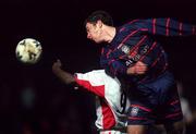 11 January 2000; Keith Doyle of St Patrick's Athletic in action against Eric Levine of Galway United during the Harp Larger FAI Cup Second Round Replay match between St Patrick's Athletic and Galway United at Richmond Park in Dublin. Photo by David Maher/Sportsfile