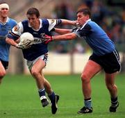 19 July 1999; Kevin Fitzpatrick of Laois in action against Jonathan Magee of Dublin during the Bank of Ireland Leinster Senior Football Championship Semi-Final Replay between Dublin and Laois at Croke Park in Dublin. Photo by Damien Eagers/Sportsfile