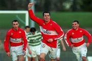 9 January 2000; Liam O'Brien of Cork City celebrates after scoring his side's goal, alongside team-mates Ollie Cahill, left, and Pat Morley, right, during the Harp Larger FAI Cup Second Round match between Shamrock Rovers and Cork City at Morton Stadium in Santry, Dublin. Photo by David Maher/Sportsfile