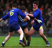 16 January 2000; Michael Casey of Dublin in action against against David Blessington, left, and Donal Ledwith of Longford during the O'Byrne Cup Semi-Final match between Longford and Dublin at Pearse Park in Longford. Photo by Damien Eagers/Sportsfile