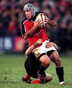 8 January 2000; Mike Mullins of Munster is tackled by Kevin Sorrell of Saracens during the Heineken Cup Pool 4 Round 5 match between Munster and Saracens at Thomond Park in Limerick. Photo by Brendan Moran/Sportsfile