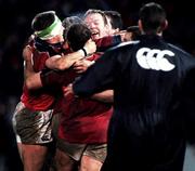 8 January 2000; Munster players celebrate their victory following the Heineken Cup Pool 4 Round 5 match between Munster and Saracens at Thomond Park in Limerick. Photo by Brendan Moran/Sportsfile
