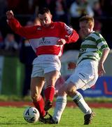 9 January 2000; Ollie Cahill of Cork City in action against Gino Brazil of Shamrock Rovers during the Harp Larger FAI Cup Second Round match between Shamrock Rovers and Cork City at Morton Stadium in Santry, Dublin. Photo by David Maher/Sportsfile