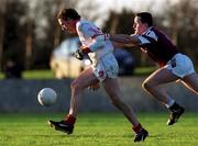 9 January 2000; Paddy McGuigan of Louth in action against Adrian Corcoran of Westmeath during the O'Byrne Cup First Round match between Louth and Westmeath at St Mary's GAA Club in Ardee, Louth. Photo by Ray McManus/Sportsfile