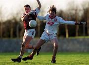 9 January 2000; Paddy McGuigan of Louth in action against Adrian Corcoran of Westmeath during the O'Byrne Cup First Round match between Louth and Westmeath at St Mary's GAA Club in Ardee, Louth. Photo by Ray McManus/Sportsfile