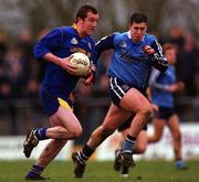 16 January 2000; Enda Barden of Longford in action against Jonathan Magee of Dublin during the O'Byrne Cup Semi-Final match between Longford and Dublin at Pearse Park in Longford. Photo by Damien Eagers/Sportsfile