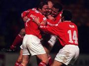 21 January 2000; Shelbourne's Paul Doolin, second from left, is congratulated by team-mates, from left, Dessie Baker, Stephen Geoghegan and Pat Fenlon after scoring their second goal during the Eircom League Premier Division match between Shelbourne and Shamrock Rovers at Tolka Park in Dublin. Photo by David Maher/Sportsfile