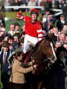 18 March 1998; Jockey Richard Dunwoody, onboard Florida Pearl, celebrates after winning the Royal & Sunalliance Chase during Day Two of the Cheltenham Racing Festival at Prestbury Park in Cheltenham, England. Photo by Matt Browne/Sportsfile
