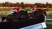 28 December 1999; Rince Ri, with Conor O'Dwyer up, jump the last ahead of Florida Pearl, with Tom Rudd up, on the way to winning the Ericsson Steeplechase at Leopardstown Racecourse in Dublin. Photo by Matt Browne/Sportsfile