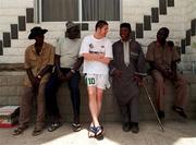 30 March 1999; Republic of Ireland's Robbie Keane talks to locals near their team hotel in Nigeria, at the 1999 FIFA World Youth Championship Finals. Photo by David Maher/Sportsfile