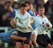 28 December 1999; Ronan O'Gara of Cork Constitution in action against Paul Neville, left, and Colin Varley of Garryowen during the AIB All-Ireland League Division 1 match between Cork Constitution and Garryowen at Temple Hill in Cork. Photo by Brendan Moran/Sportsfile