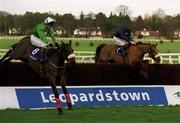 26 December 1999; Slaney Native, with Jason Titley up, 8, jumps the last shead of eventual winner Native Upmanship, with Conor O'Dwyer up, during the Denny Gold Medal Novice Chase at Leopardstown Racecourse in Dublin. Photo by Ray McManus/Sportsfile