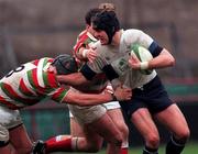 29 January 2000; Eric Delreux of Wanderers is tackled by Paul Hatton of Bective Rangers during the AIB All-Ireland League Division 2 match between Wanderers RFC and Bective Rangers FC at Lansdowne Road in Dublin. Photo by Damien Eagers/Sportsfile