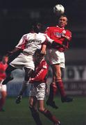 28 January 2000; Eric Lavine of Galway United in action against Tony McCarthy and James Keddy of Shelbourne during the Eircom League Premier Division match between Shelbourne and Galway United at Tolka Park in Dublin. Photo by David Maher/Sportsfile