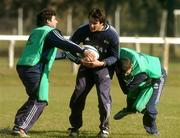 30 May 2007; Argentina's Pablo Bonza is tackled by Hernan Senillosa, left, and Manuel Contepomi, right, during squad training. Argentina Rugby training, Pilar, Argentina. Picture credit: Pat Murphy / SPORTSFILE