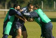 30 May 2007; Argentina's Santiago Gonzalez Bonorino is tackled by Frederico Todeschini, left, and Martin Duand, right, during squad training. Argentina Rugby training, Pilar, Argentina. Picture credit: Pat Murphy / SPORTSFILE